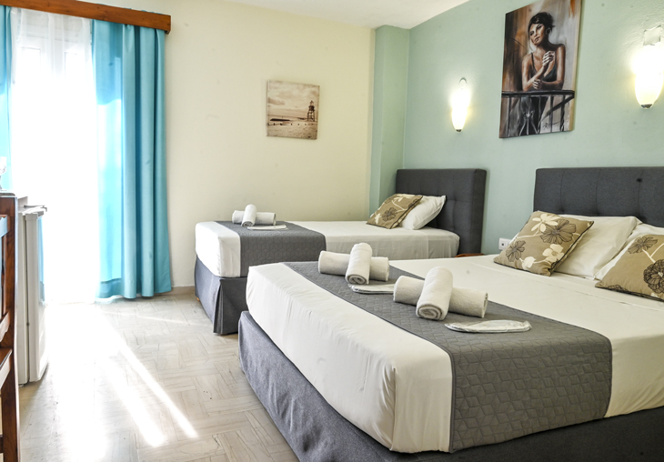 Gina studios benitses - twin room beds